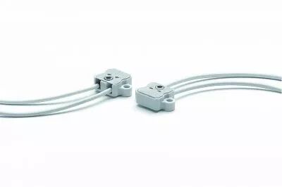 Douille st�atite G4/GX5,3/G6,35/GY6,35 24V 10A T300�C, c�ble T180�C 0,75mm� longueur 125mm, fixation par vis M3, trous excentr�s