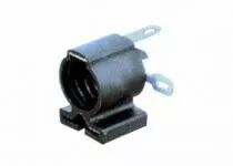 Douille pour lampe miniature E10, 24V 0,5A, T80°C thermoplastique autoextinguible, avec guide pour languette métallique à souder